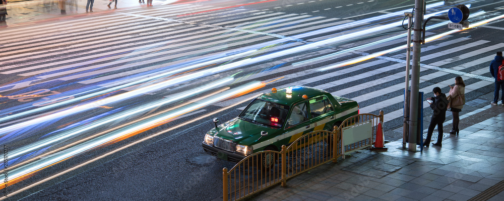 Taxi With Traffic Light Trails At Night In Tokyo Japan 夜の東京 タクシーと車の光跡 Stock Photo Adobe Stock