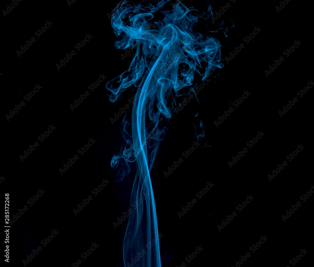 Fototapeta premium movement of Light blue smoke Abstract on black background.