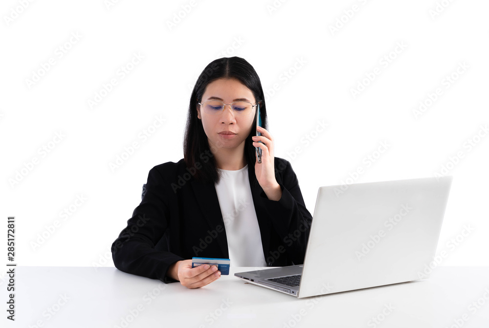 Businesswoman working at her office via laptop . isolated white background. Businesswoman working at her office via laptop . isolated white background.