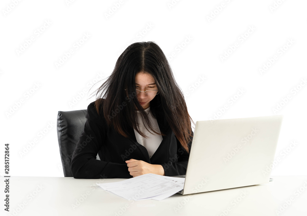 Woman wearing glasses and being stressed at work on her computer. Woman wearing glasses and being stressed at work on her computer.