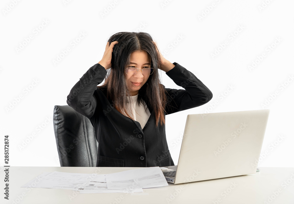 Woman wearing glasses and being stressed at work on her computer. Woman wearing glasses and being stressed at work on her computer.