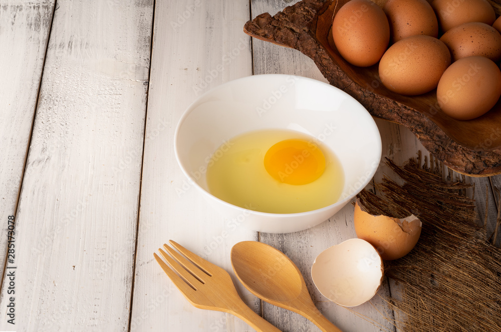 Fresh chicken eggs on white wooden table background. Fresh chicken eggs on white wooden table background.