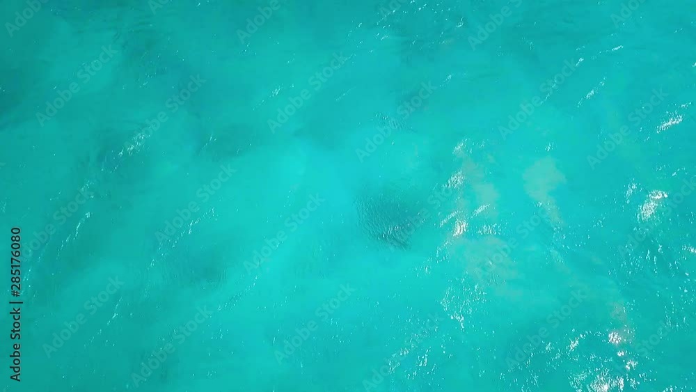 Turquoise water with some spots of coral reef in the waters of Hawaii right off the coast from a park called Kaiona Beach on Oahu. Turquoise water with some spots of coral reef in the waters of Hawaii right off the coast from a park called Kaiona Beach on Oahu.