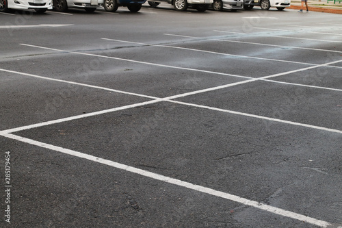 Image of empty parking area after raining. 