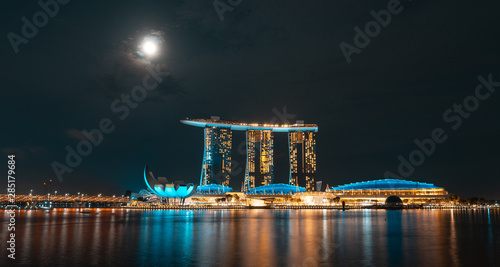 SINGAPORE - MAY 19, 2019: Marina Bay Sand Hotel & The Lotus by the sea in Singapore by night.