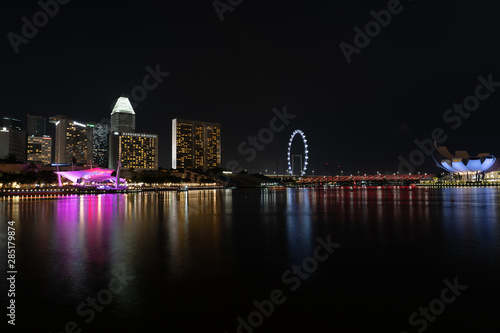 SINGAPORE - MAY 19, 2019: View of the Downtown Singapore skyline and Marina Bay at night.
