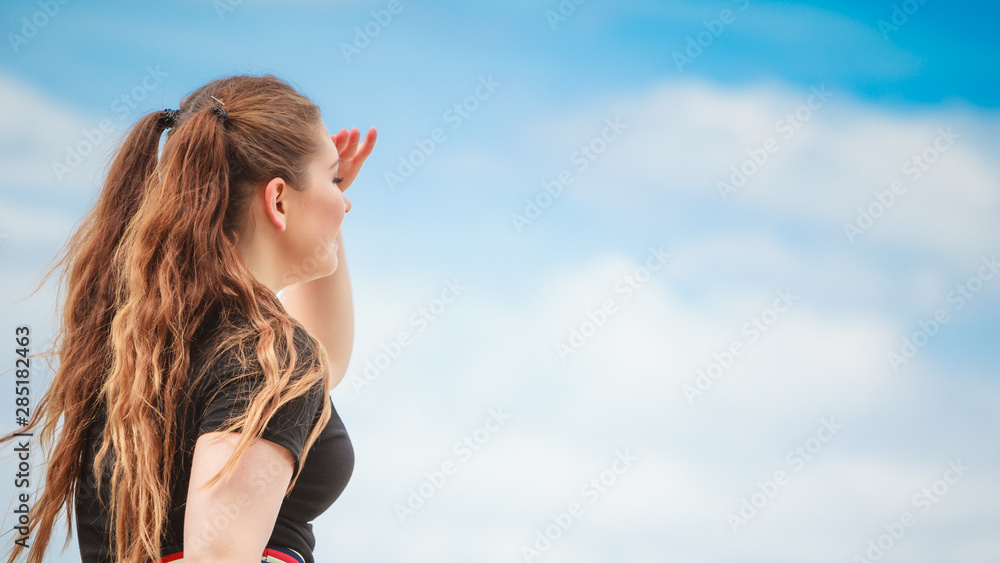 Dreaming woman looking at sky Dreaming woman looking at sky