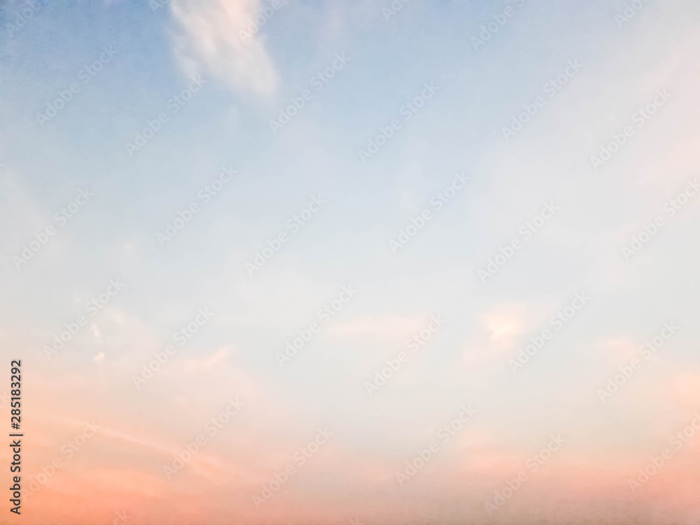 sky background, Cumulus white clouds in the blue sky at sunset, Cloudy sky with bright sunshine