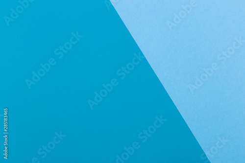 Paper blue empty background, geometrically located. Color blank for presentations, copy space.