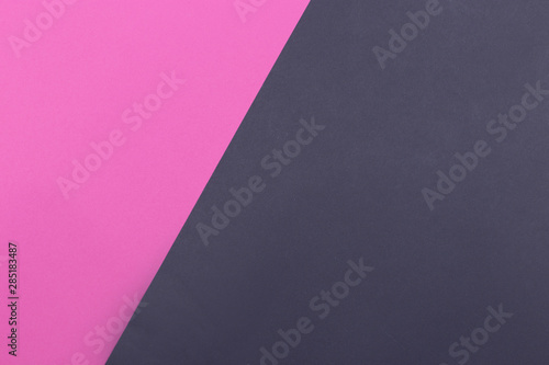 Paper pink  black empty background  geometrically located. Color blank for presentations  copy space.