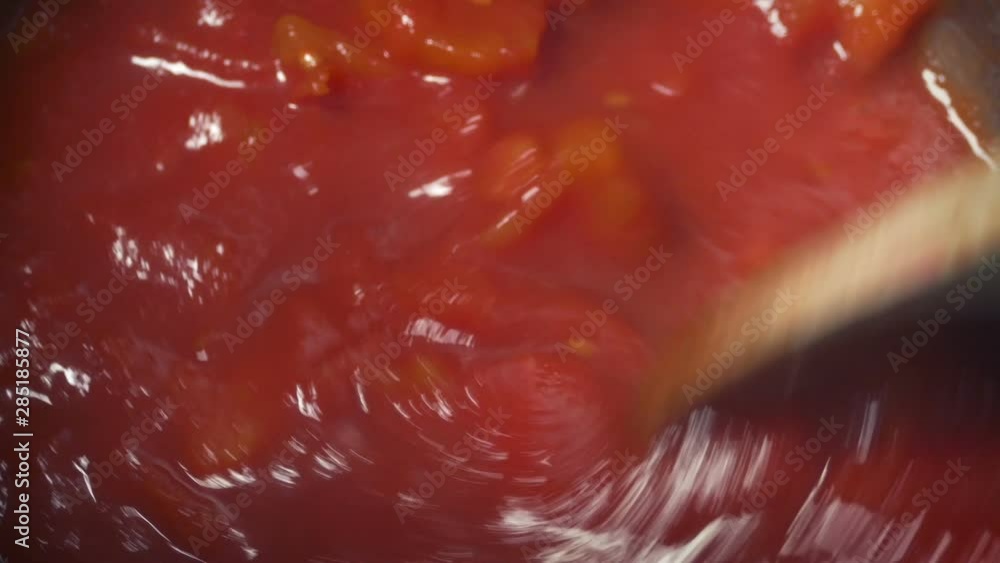 Stirring Tomatoes Cooking In Pot Stirring Tomatoes Cooking In Pot