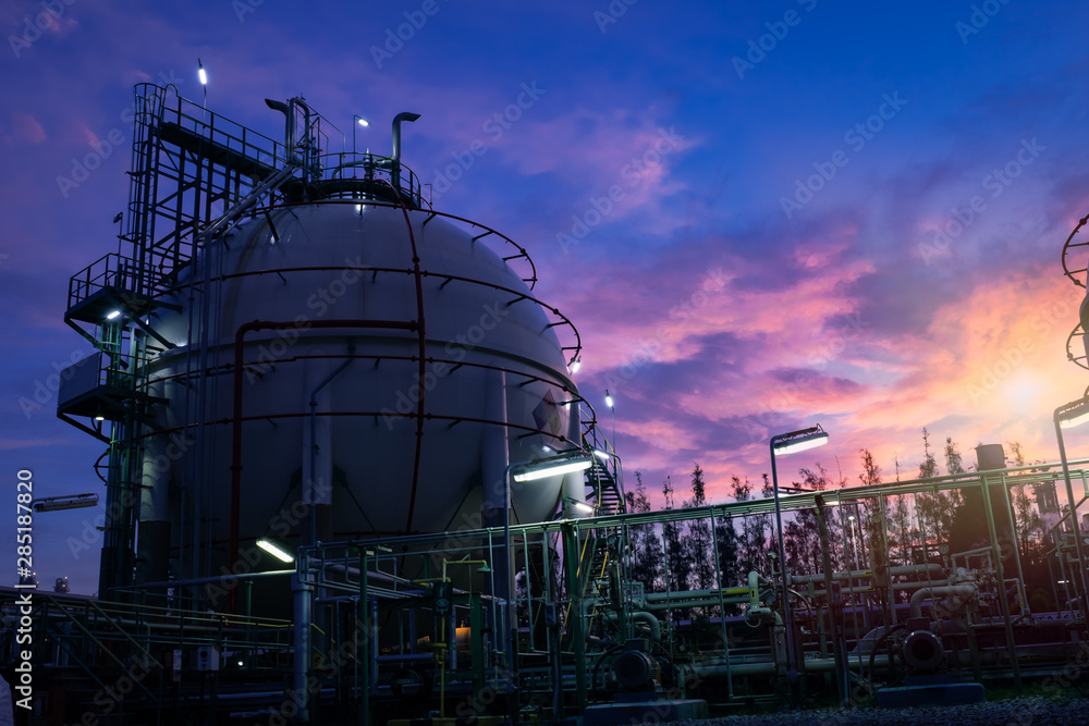 Gas storage spheres tank in petrochemical plant at dawn