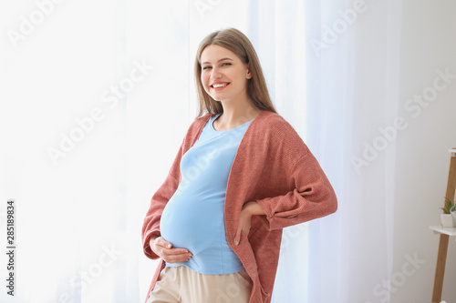 Beautiful pregnant woman at...
