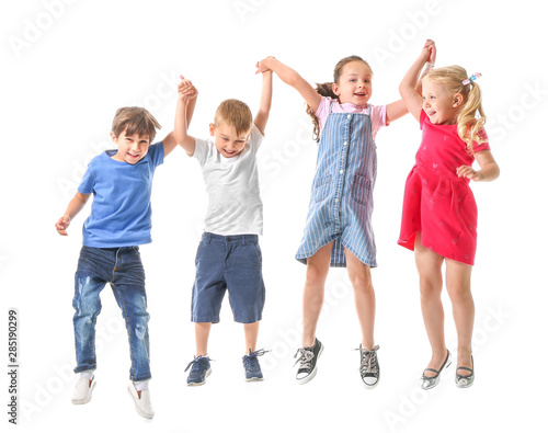 Group of jumping little children on white background