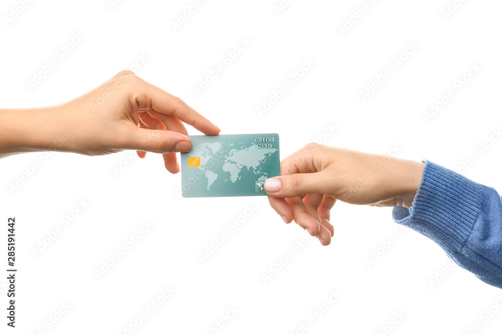 Female hands with credit card on white background Female hands with credit card on white background