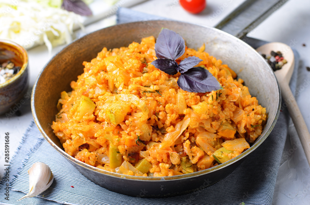 Braised Cabbage with Bulgur and Zucchini, Tasty Vegetarian Meal Braised Cabbage with Bulgur and Zucchini, Tasty Vegetarian Meal