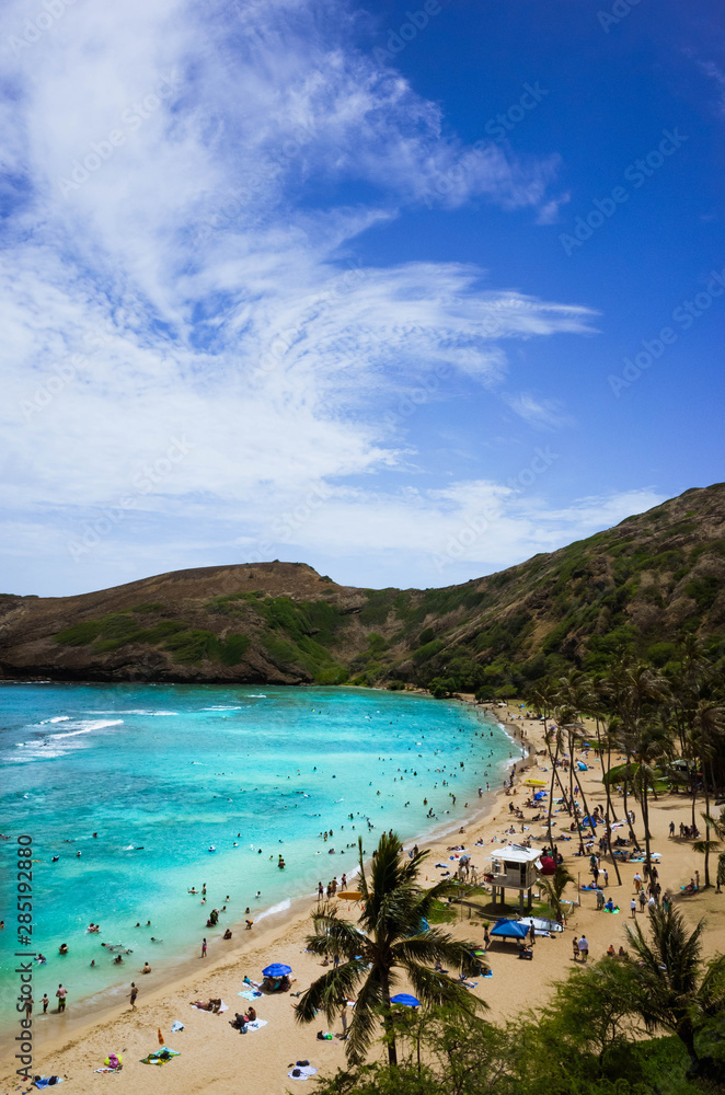 Oahu's Most Famous Beach, Hanauma Bay. Snorkelling at the coral reef of Hanauma Bay, a former volcanic crater, now a national reserve