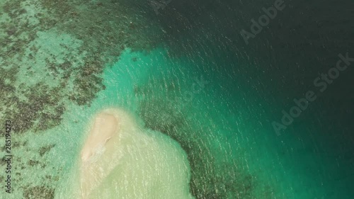 aerial seascape tropical island and sand beach, turquoise water and coral reef. malacory island, Philippines, Palawan. tourist boats on coast tropical island. photo