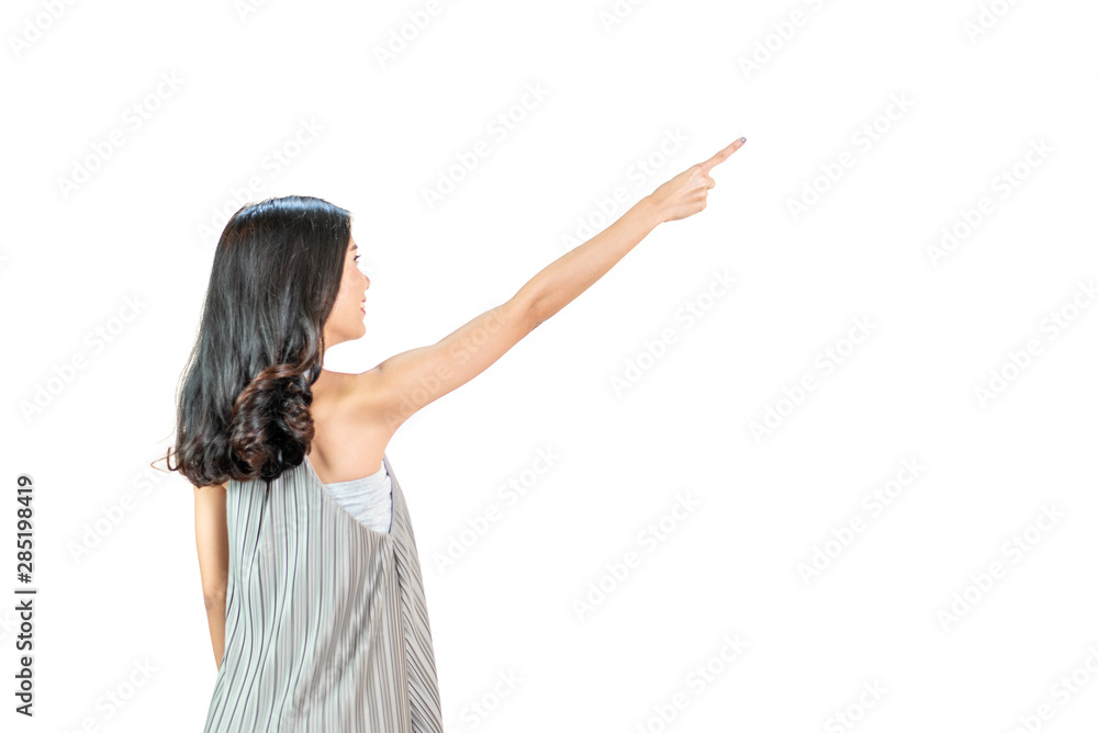 Back side body of Young asian woman standing pointing to something,long hairs black color, isolated on a white background Back side body of Young asian woman standing pointing to something,long hairs black color, isolated on a white background