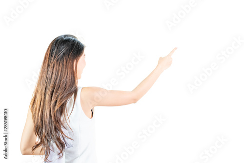 Back side body of Young asian woman standing pointing to something,long hairs black color, isolated on a white background