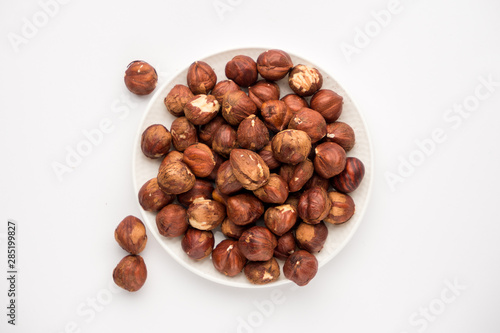 nutritious nuts, hazelnuts on a white background