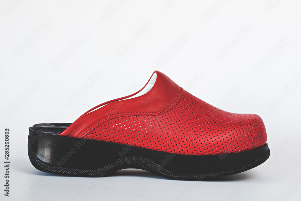 Orthopedic slipper isolated over background, top of view Orthopedic slipper isolated over background, top of view