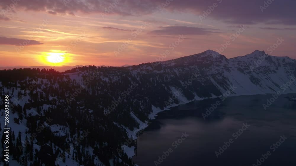 Aerial Oregon Crater Lake Snowy May 2019 Sunset 30mm 4K Inspire 2 Aerial video of Crater Lake National Park during a beautiful sunset with snow. Aerial Oregon Crater Lake Snowy May 2019 Sunset 30mm 4K Inspire 2 Aerial video of Crater Lake National Park during a beautiful sunset with snow.