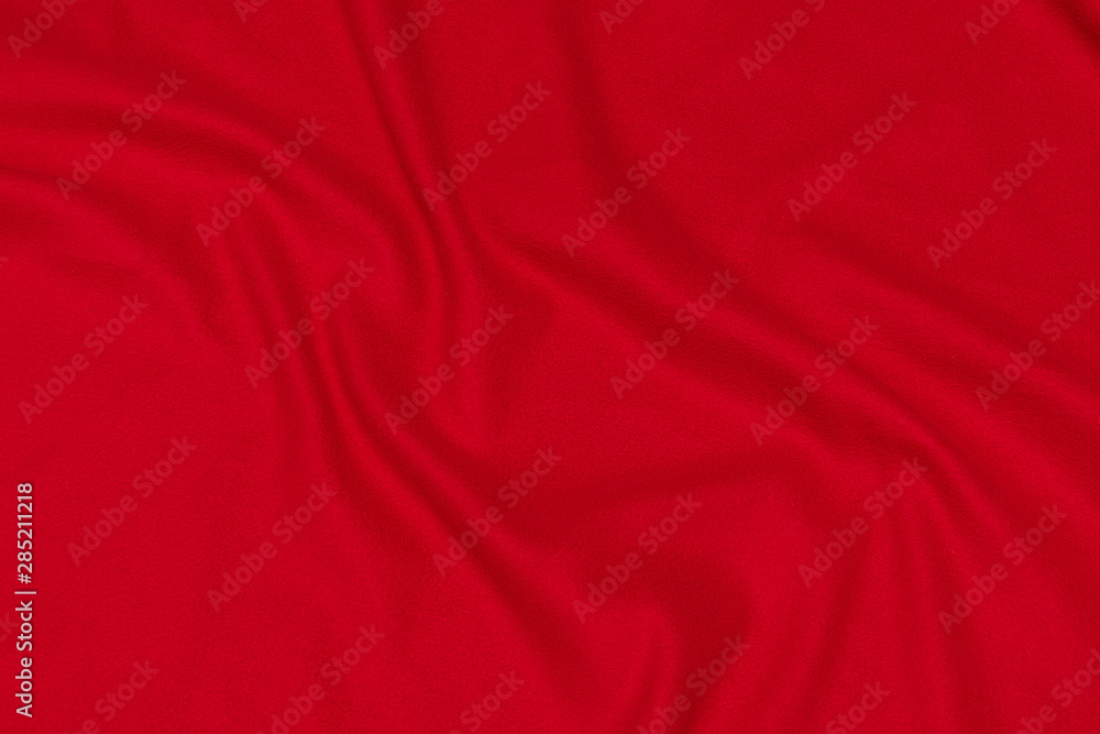 Red crumpled blanket, texture, top view Red crumpled blanket, texture, top view