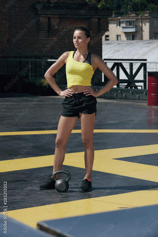 Fototapeta premium Sport woman in sportswear after fitness workout on street