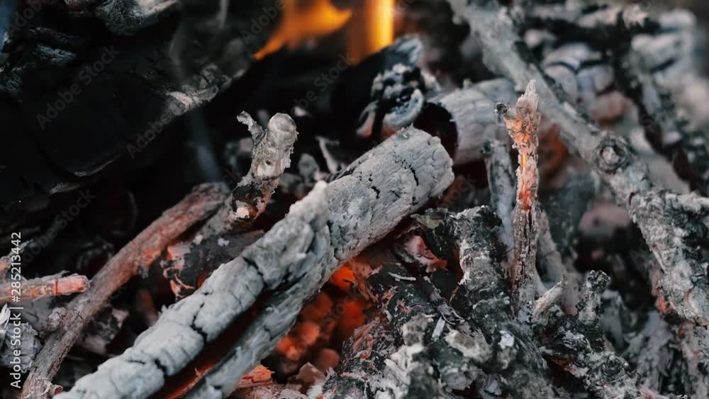close up bonfire flames of camping fire, Super slow motion burning firewood. close up bonfire flames of camping fire, Super slow motion burning firewood.