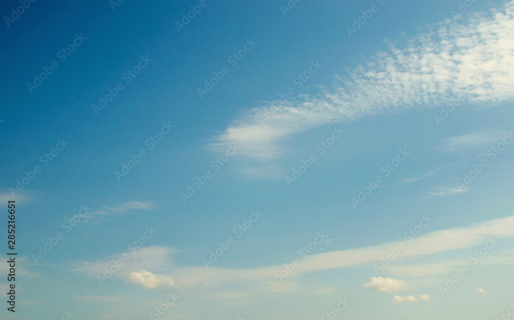 Fototapeta premium Beautiful white clouds on blue sky on a sunny day