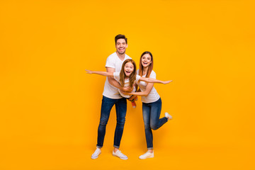 Full body photo of family spending leisure time together wear casual outfit isolated yellow background