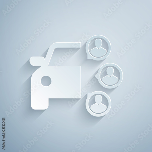 Paper cut Car sharing with group of people icon isolated on grey background. Carsharing sign. Transport renting service concept. Paper art style. Vector Illustration