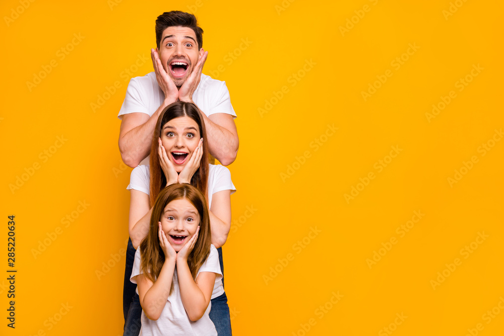 Portrait of three nice attractive charming lovely cute careful cheerful cheery stunned person in order of hierarchy unexpected great news isolated over bright vivid shine yellow background - obrazy, fototapety, plakaty 