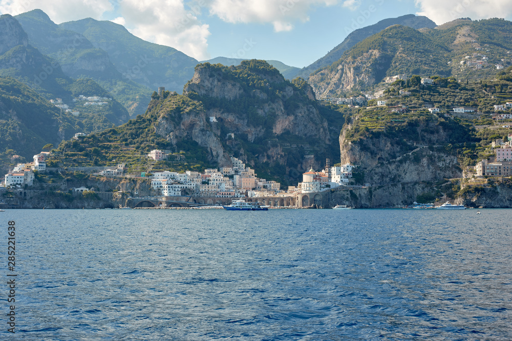 View from a boat to the italian coastline town Atrani in Amalfi coast.