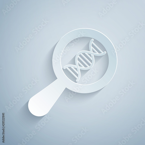 Paper cut DNA research, search icon isolated on grey background. Magnifying glass and dna chain. Genetic engineering, cloning, paternity testing. Paper art style. Vector Illustration