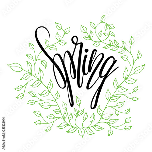 Hand lettering spring with green branches