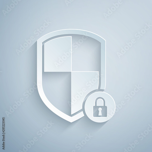 Paper cut Shield security with lock icon isolated on grey background. Protection, safety, password security. Firewall access privacy sign. Paper art style. Vector Illustration