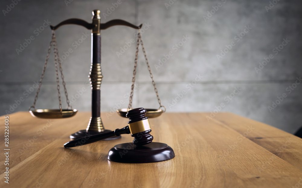 Law and Justice Concept Image, Grey stone background Law and Justice Concept Image, Grey stone background