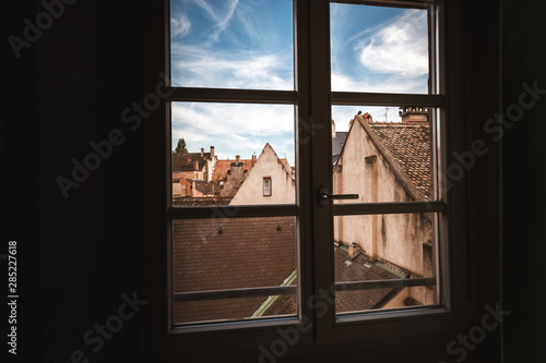 view from the hotel window on the roofs of houses in France