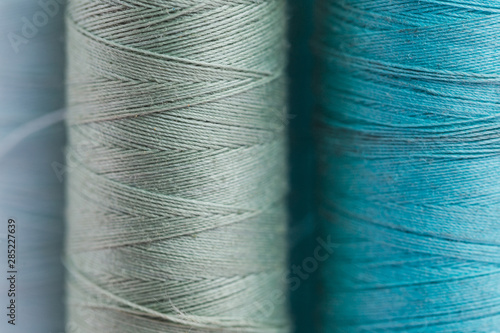 Obraz na plátne Group of blue thread reels