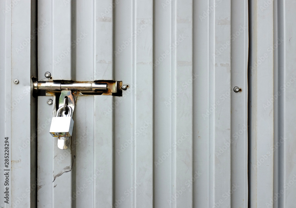 Close up key locked at metal door. Close up key locked at metal door.