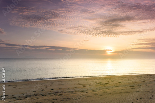 Fototapeta Naklejka Na Ścianę i Meble -  beautiful sunrise view at the beach with a dramatic clouds. concept of beautiful nature