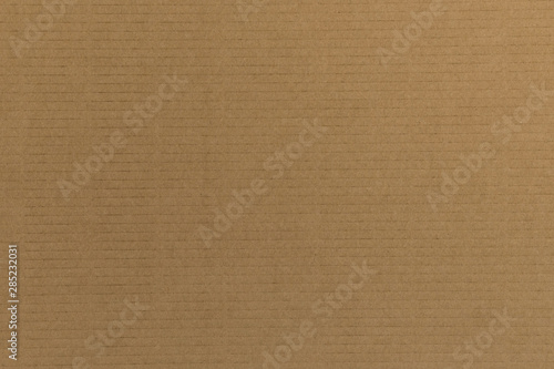 Decorative background of brown cardboard