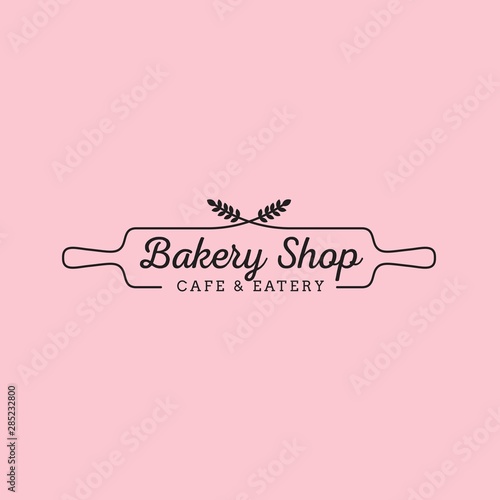 Simple feminine bakery logo design with wheat and wood rolling pin