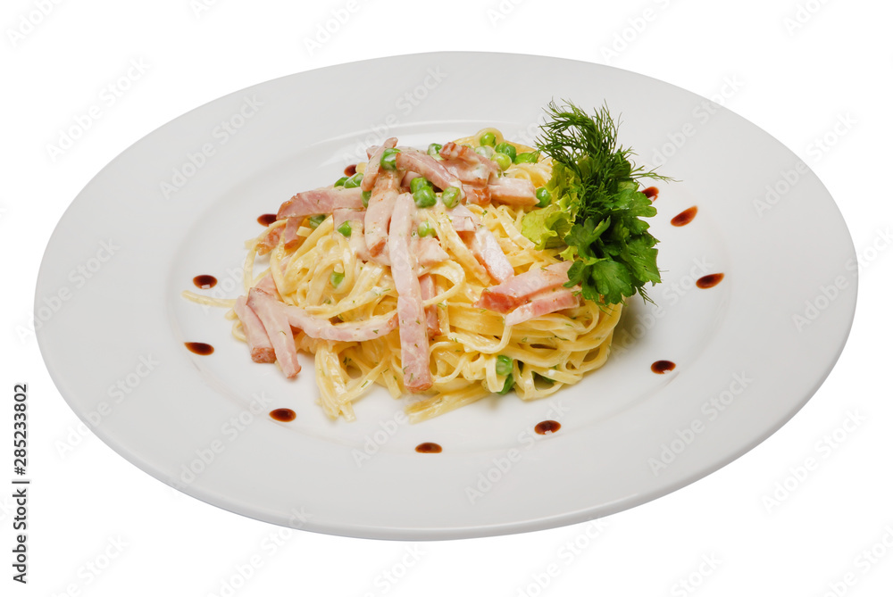 Stir-fried noodles, mixed greens in white sauce on a white isolated background
