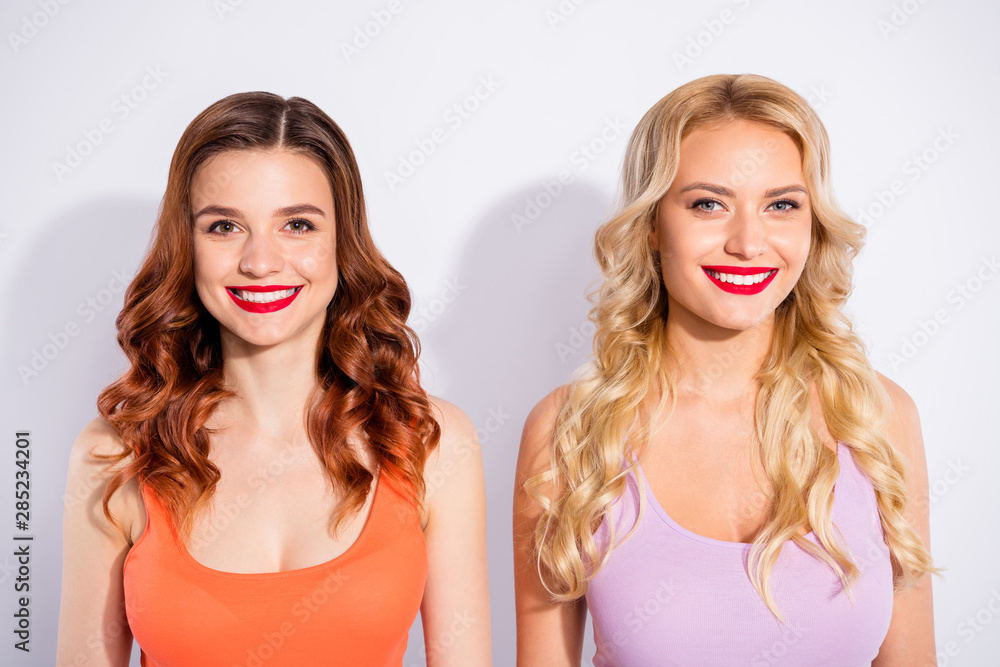 Close-up portrait of two nice attractive lovely lovable cheerful cheery wavy-haired person isolated over white light background Close-up portrait of two nice attractive lovely lovable cheerful cheery wavy-haired person isolated over white light background