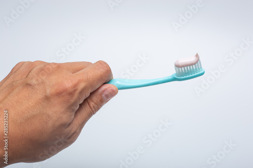 Toothbrush  toothpaste and cup