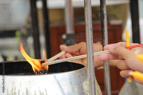 Flaming, Praying, Bangkok, Thailandn photo