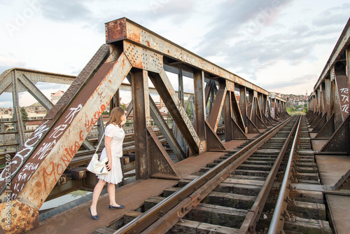 Woman on the railway bridge